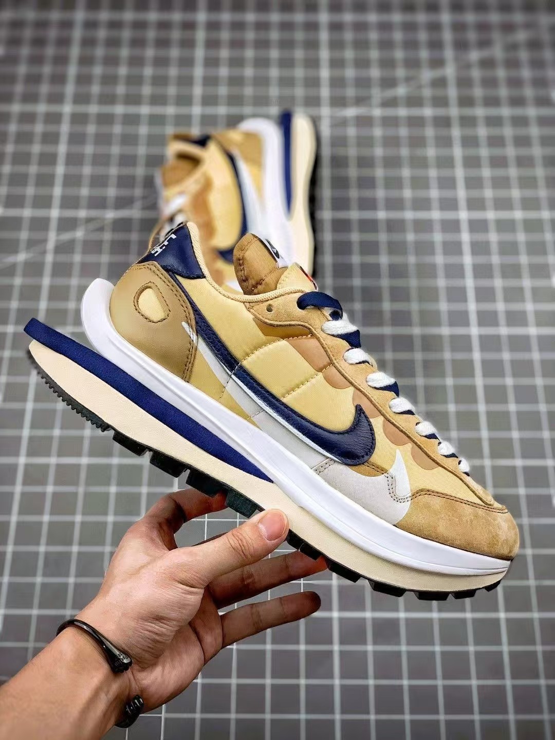 Sacai x Nike VaporWaffle sesame and blu e void