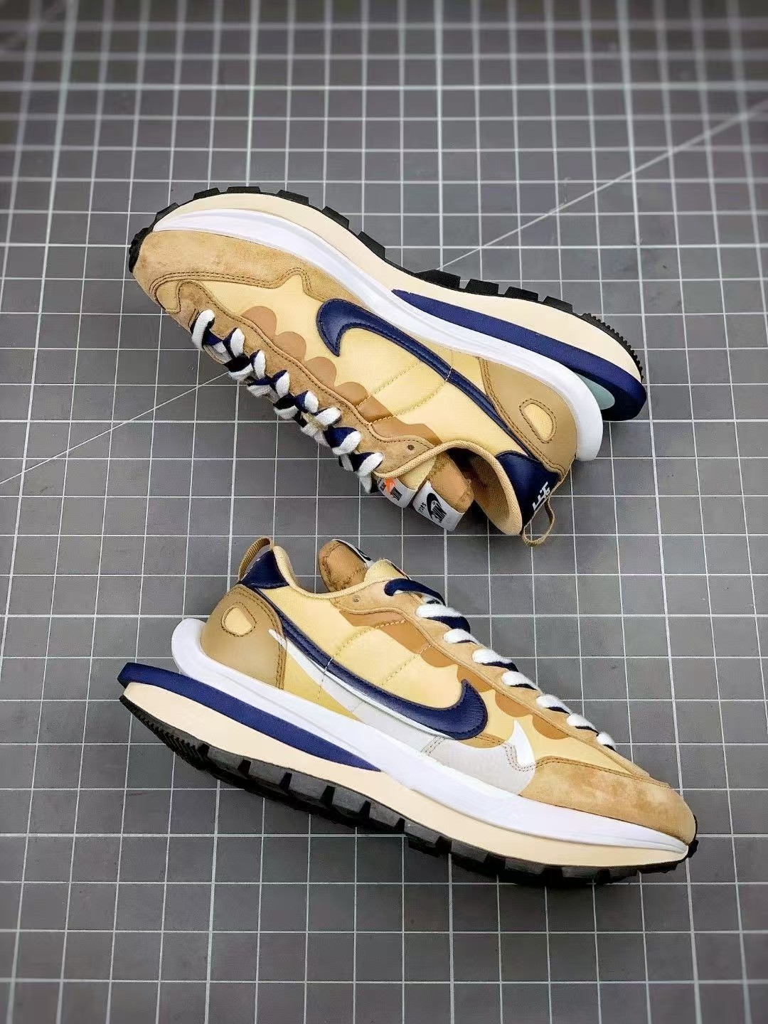 Sacai x Nike VaporWaffle sesame and blu e void