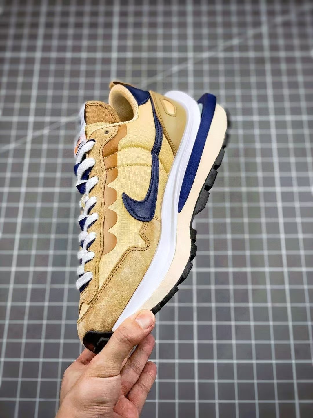 Sacai x Nike VaporWaffle sesame and blu e void