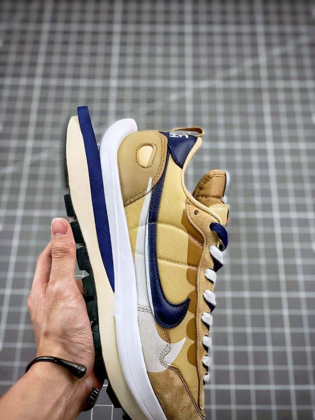 Sacai x Nike VaporWaffle sesame and blu e void