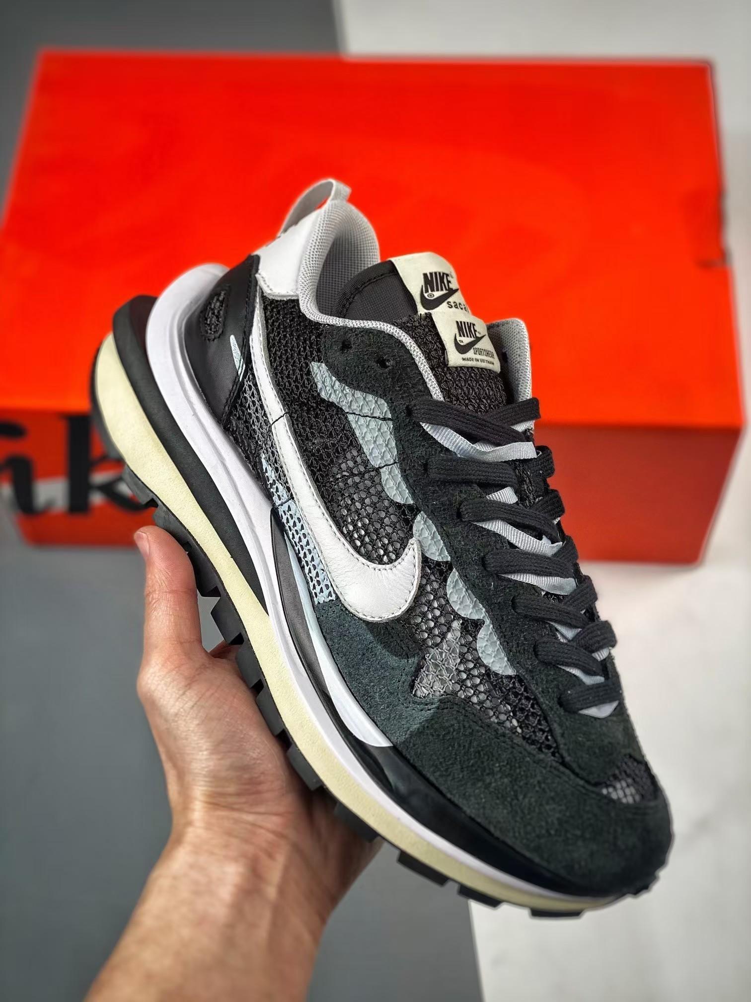 Sacai x Nike VaporWaffle black and white