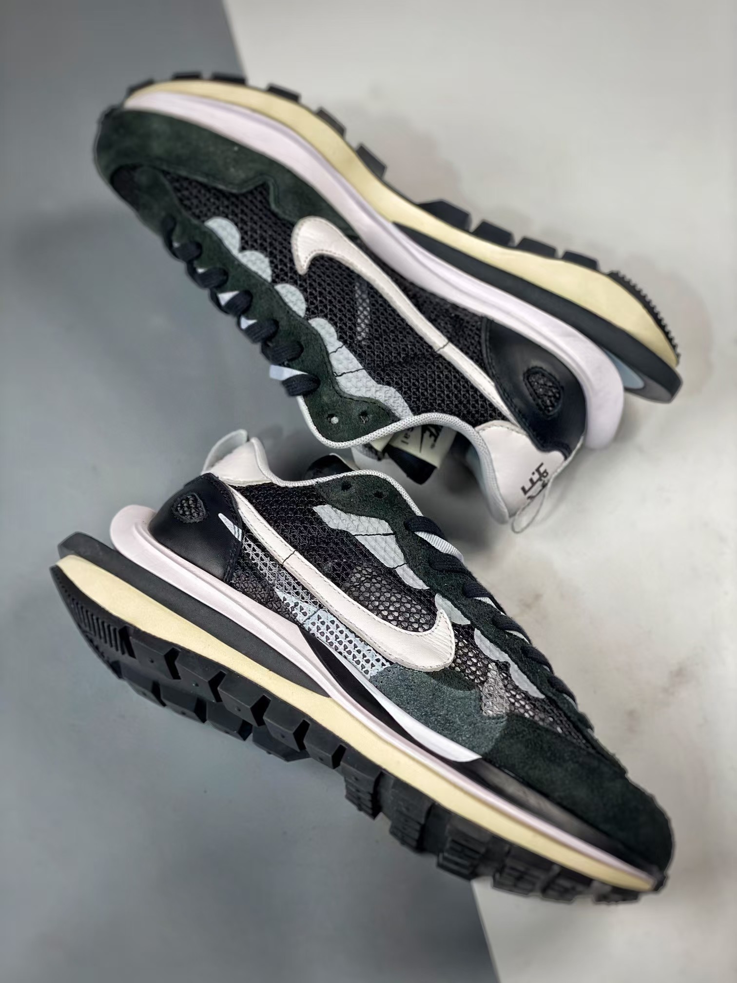 Sacai x Nike VaporWaffle black and white